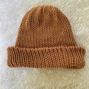 Crochet handmade slouchy hat in mustard.